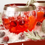 Pin image for Cranberry Old Fashioned Cocktail with red cocktail in round glass with silver rim and title at bottom