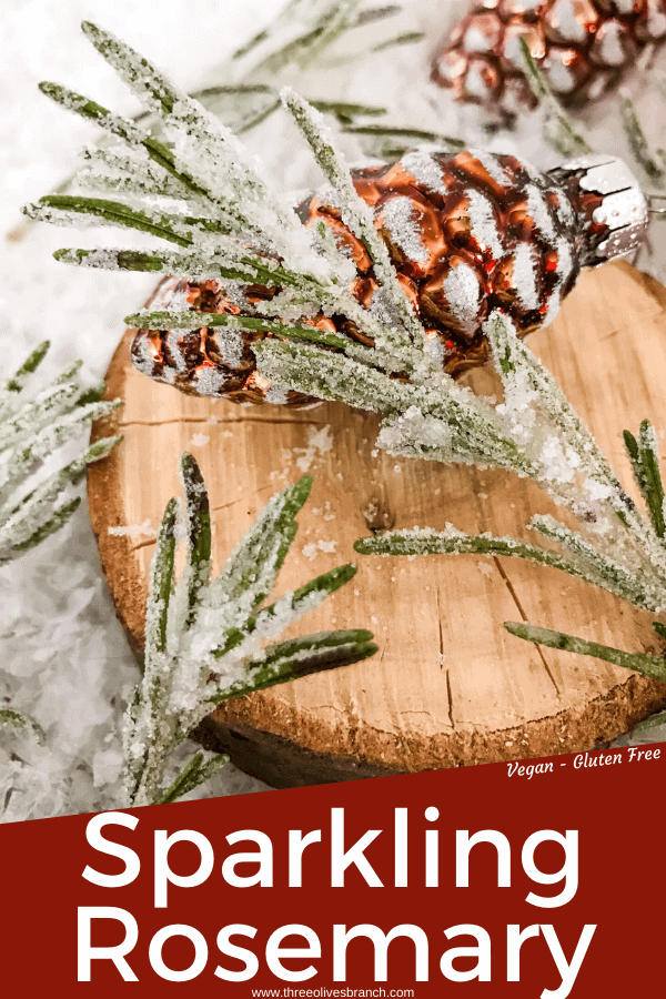 Pin image for Sparkling Rosemary (Sugared Rosemary) on a slice of wood with title at bottom