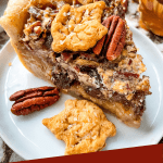 Pin of a slice of Chocolate Bourbon Pecan Pie with title