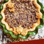 Pin of an entire Chocolate Bourbon Pecan Pie in a green dish with title