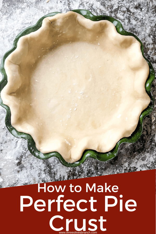 Pin image for Perfect Pie Crust Tips of dough in a green fluted pie dish with title at bottom