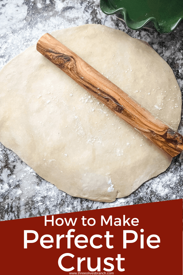 Pin image for Perfect Pie Crust Tips of a rolling pin on a round of dough with title at bottom
