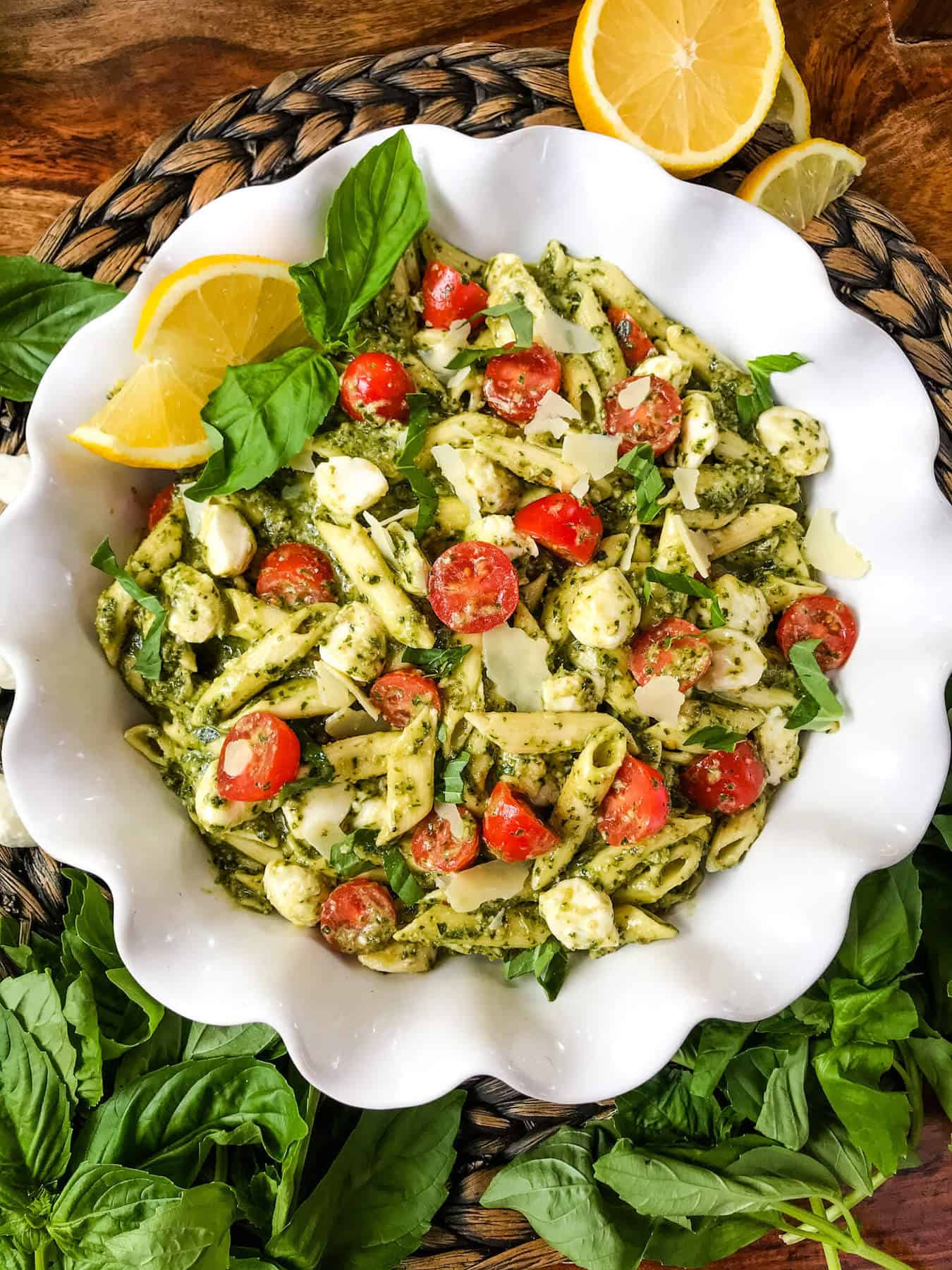 Top view of Pesto Caprese Penne Pasta in a white dish