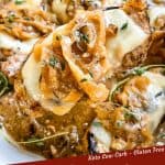 Pin image for keto French Onion Pork Chops being scooped out of a dish with title at bottom
