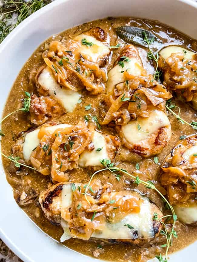 French Onion Pork Chops with the sauce in a large serving dish