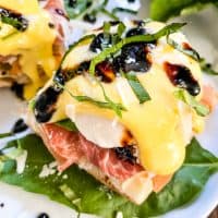 A stack of Italian Prosciutto Eggs Benedict