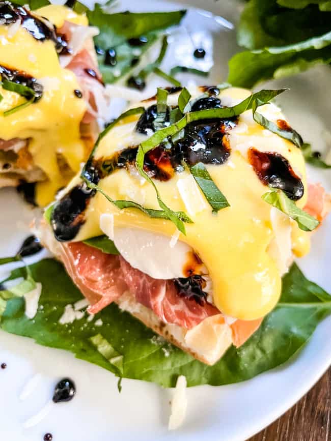 A stack of Italian Prosciutto Eggs Benedict