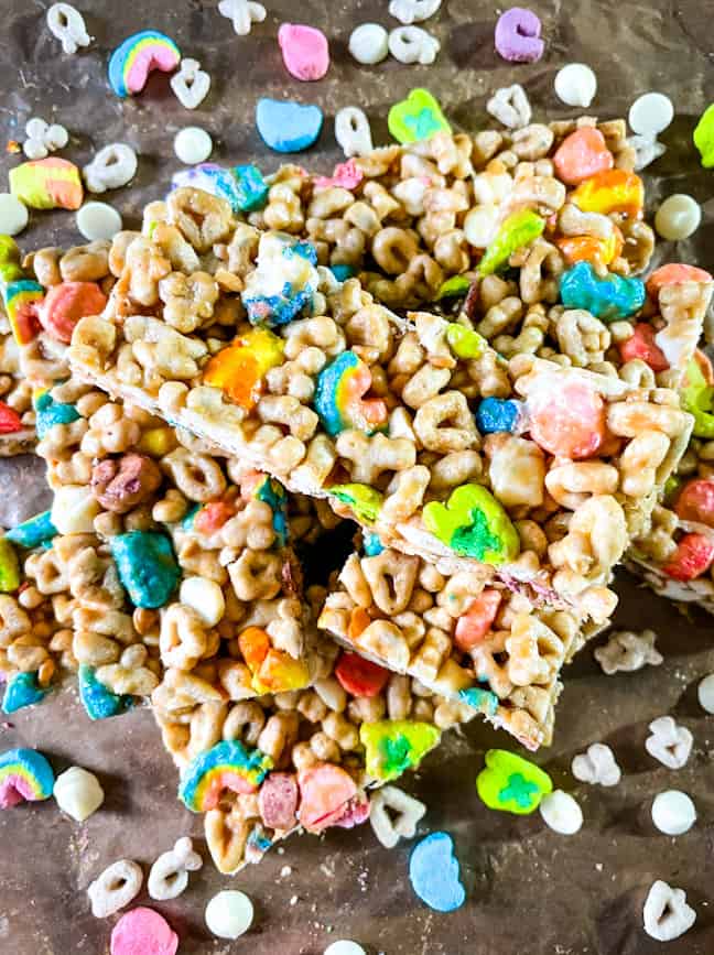 A pile of the bars on parchment with cereal around it