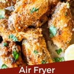Pin image for Lemon Pepper Chicken Wings Air Fryer recipe of a pile of wings with title
