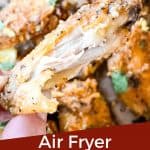 Pin image for Lemon Pepper Chicken Wings Air Fryer recipe of a hand holding a bitten wing with title at bottom