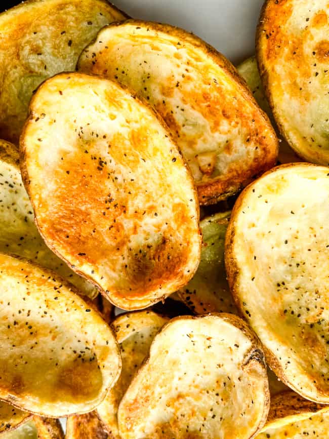 A pile of empty Air Fryer Potato Skins shells