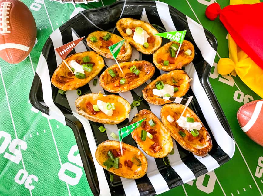 A football ref tray filled with Air Fryer Potato Skins