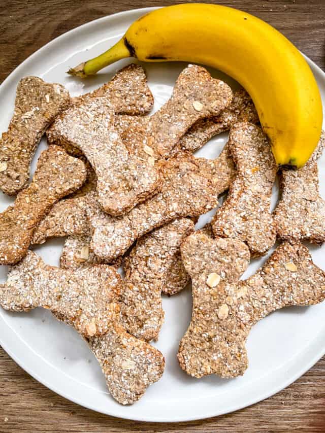 A plate with a pile of Banana Dog Treats and a banana