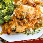 Pin image for keto French Onion Pork Chops on a plate with broccoli and title at bottom