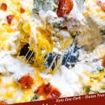 Pin image for Keto Chicken Bacon Ranch Casserole with spoon scooping casserole out of the dish with title at bottom