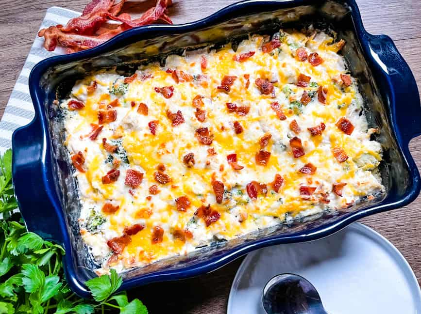 Large blue dish filled with Keto Chicken Bacon Ranch Casserole