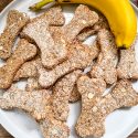 A white plate stacked with Banana Dog Treats and a banana