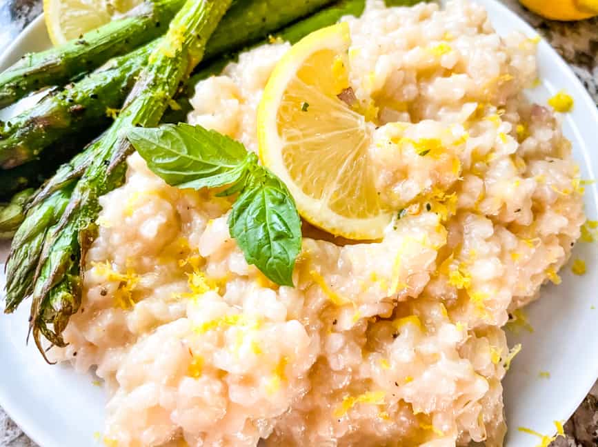 Close up of the rice on a plate with asparagus