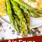 Pin image for Air Fryer Asparagus on a plate with title at bottom