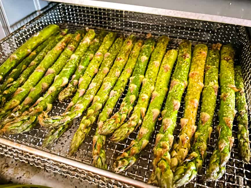 Asparagus stalks in the basket just after being cooked