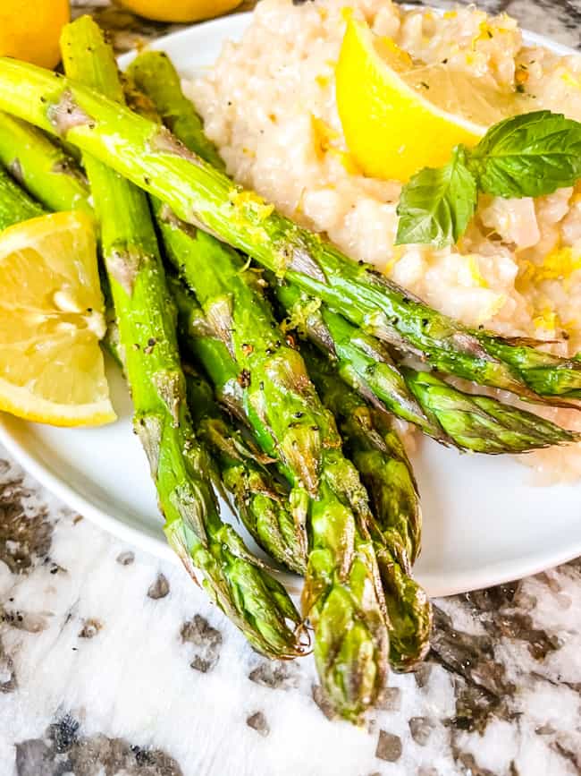 Asparagus from an air fryer on a plate 