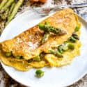 Asparagus Omelette on a white round plate