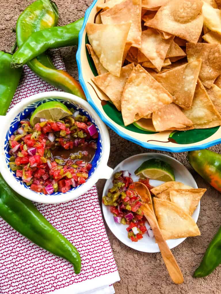 Hatch Green Chile Pico de Gallo in a bowl with chips next to it