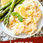 Pin image for Risotto al Limone (Lemon Risotto) on a white plate with asparagus and title at bottom