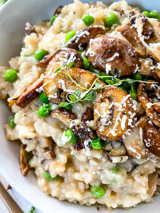 A close up of Mushroom Pea Risotto in a bowl