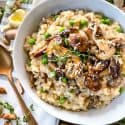 Mushroom Pea Risotto in a bowl on top of a towel