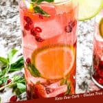 Pin image for Pomegranate Mojito of a close up of a drink with title at bottom