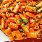 Pin image cose up of Rigatoni Arrabbiata with title at bottom