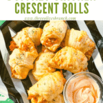 Pin image for Buffalo Chicken Crescent Rolls in a pile with title at top