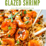 Pin image for Chipotle Orange Glazed Shrimp on noodles with chopsticks in a bowl