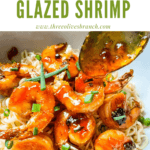 Pin image of Chipotle Orange Glazed Shrimp on noodles in a bowl