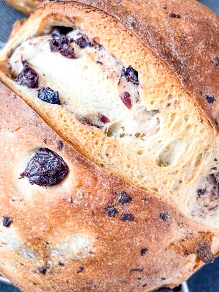 Close up top of a Sourdough Olive Bread loaf