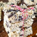 A stack of Oreo Rice Krispie Treats tied with a red and white twine