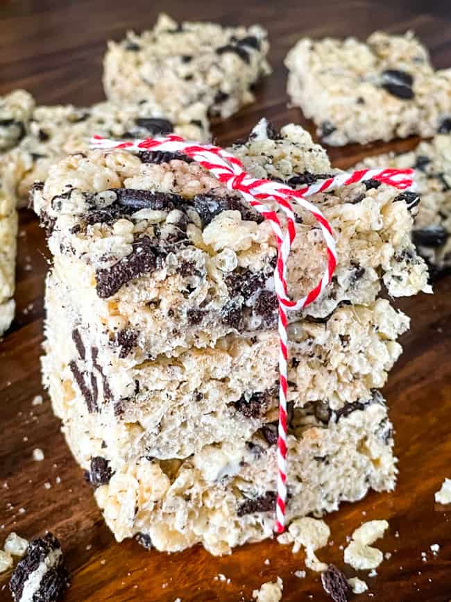 A stack of Oreo Rice Krispie Treats tied with a red and white twine