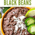 Pin image for Black Refried Beans in a yellow bowl with title at top