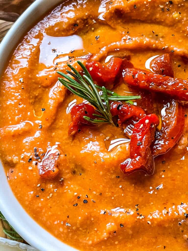 Close up of Hummus with Red Pepper in a white bowl