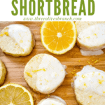 Pin image of Lemon Shortbread with glaze spread out on a cutting board with lemon slices and title at top