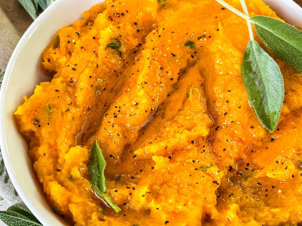 Some of the orange squash in a bowl