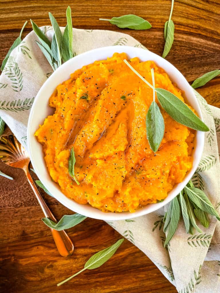 Top view of the Mashed Butternut Squash with some sage on top