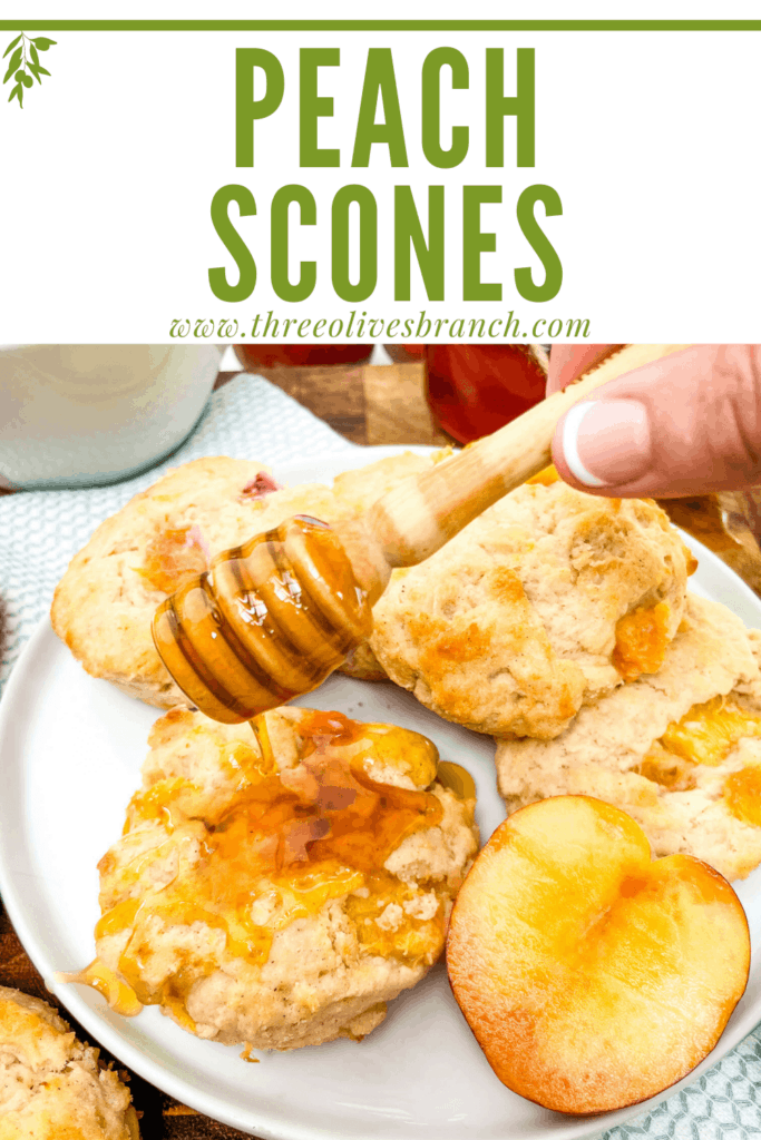Pin image of a hand drizzling honey on Peach Scones with title at top
