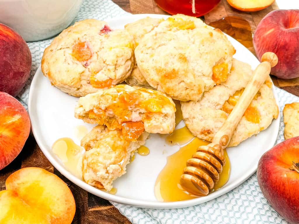 Peach Scones with honey on a plate