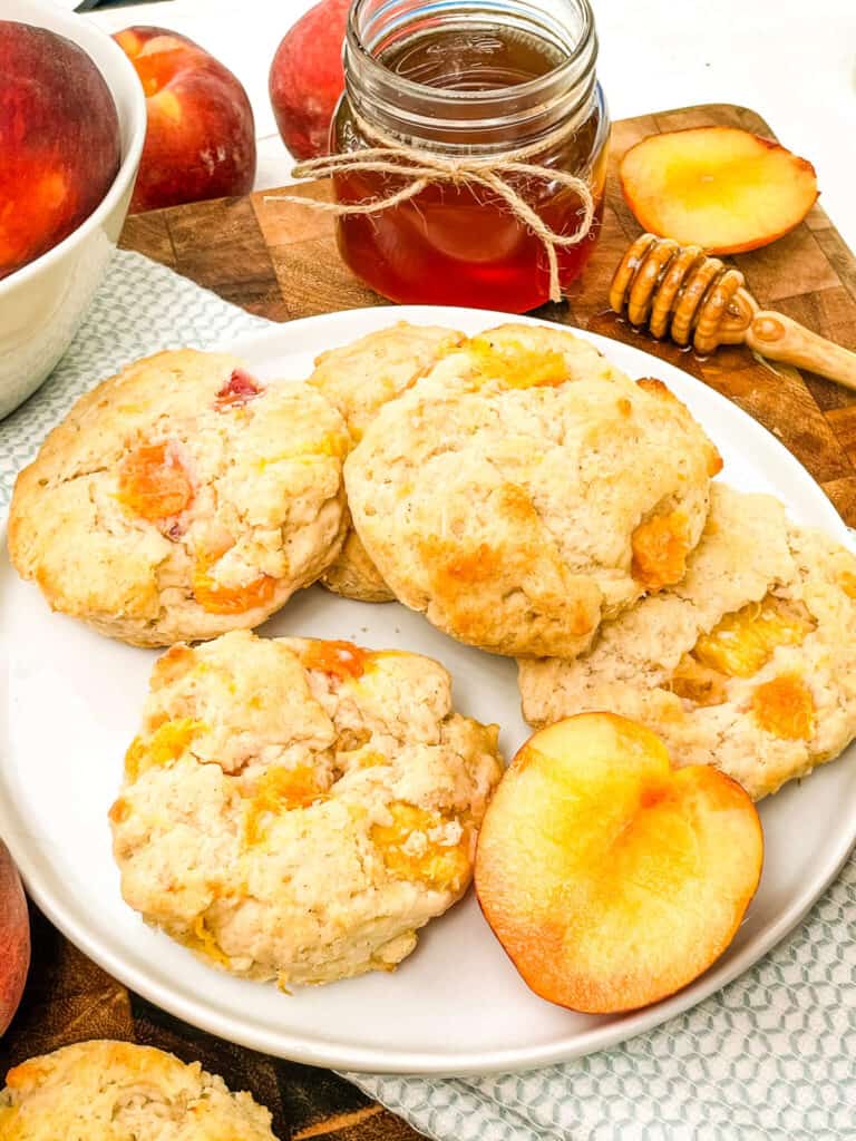 Peach Scones stacked on a white plate