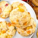 Top view of Peach Scones on a white round plate