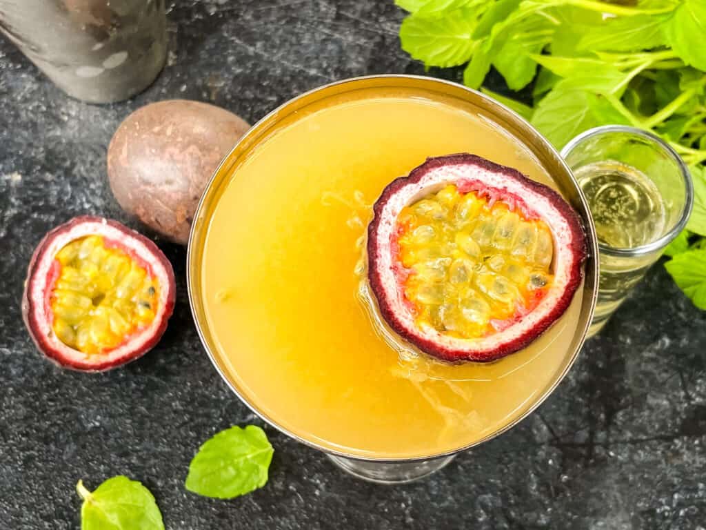 Top view of Pornstar Martini with passion fruit floating in it