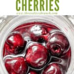 Pin image of top view of Brandied Cherries in a jar with title at top