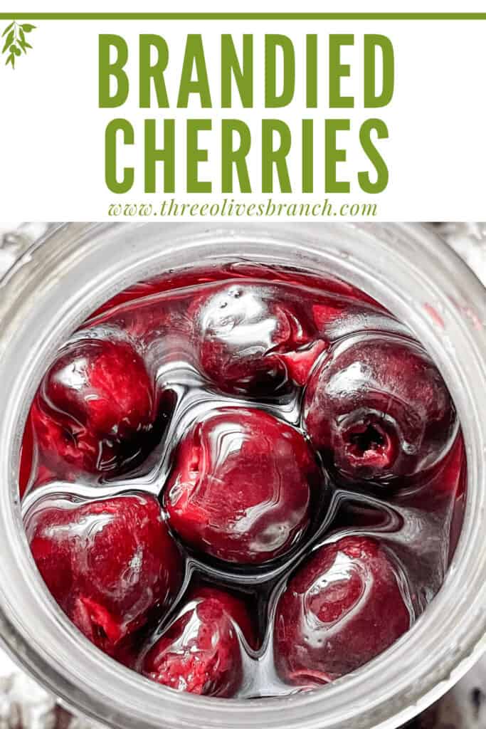 Pin image of top view of Brandied Cherries in a jar with title at top